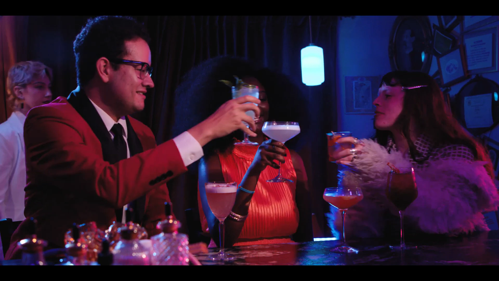 Guests sharing cocktails at the ZEMA bar